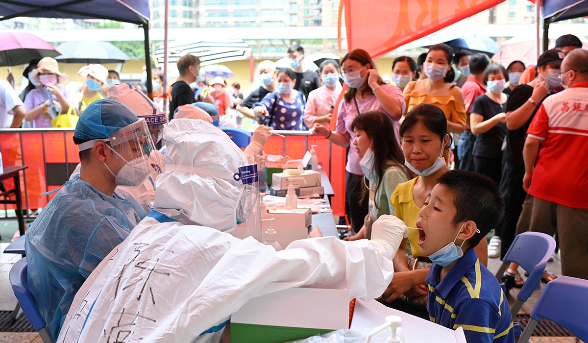 China sees highest daily coronavirus cases in current outbreak
