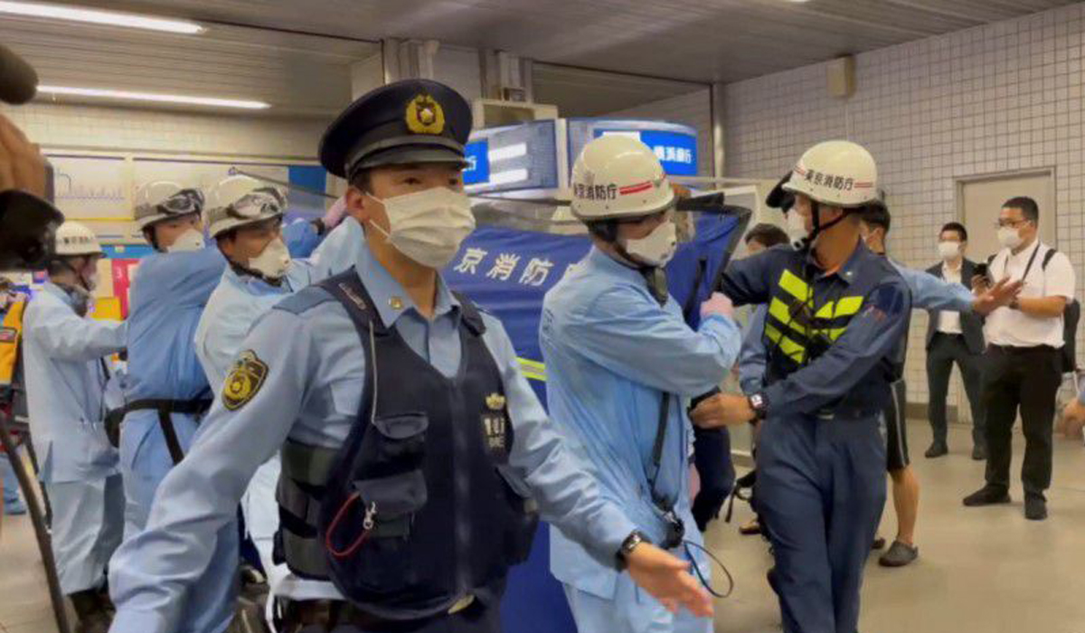 Knife attacker on Tokyo commuter train wanted to kill 'happy women'