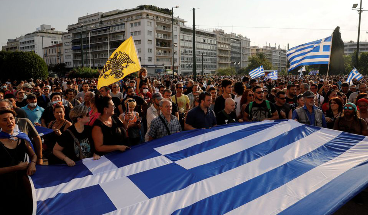 Greek police, protesters clash in protest against COVID vaccines